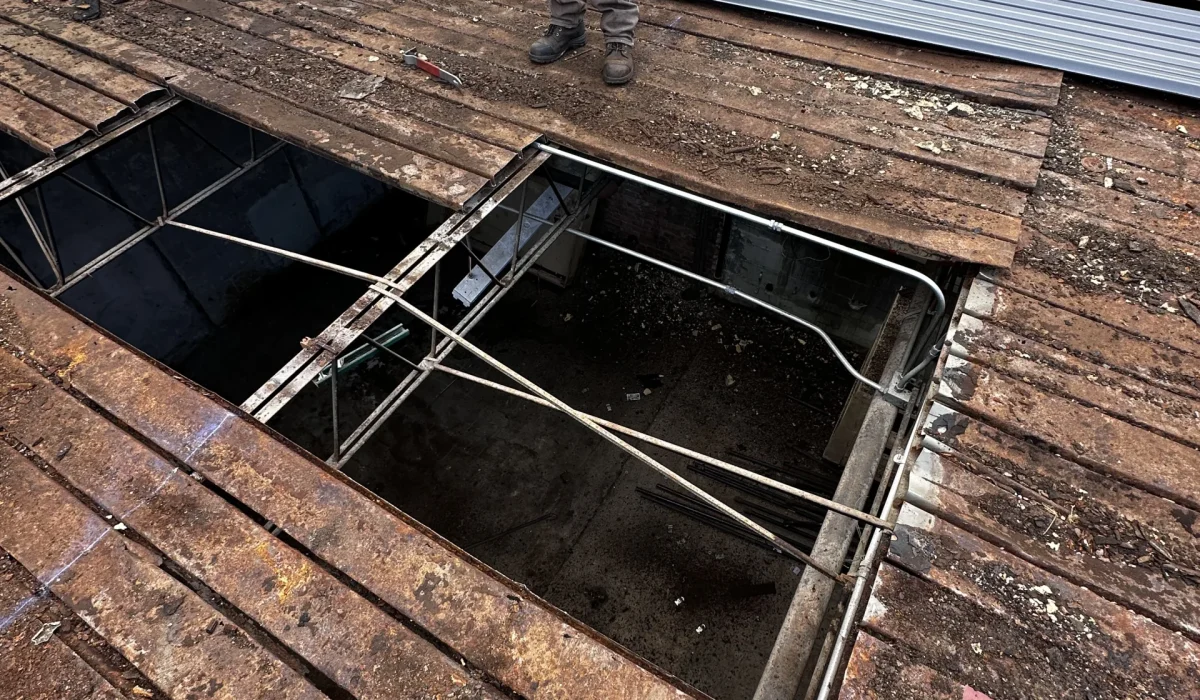 Severely rusted metal roof with large open gaps raises safety concerns, prompting decisions to repair or replace.