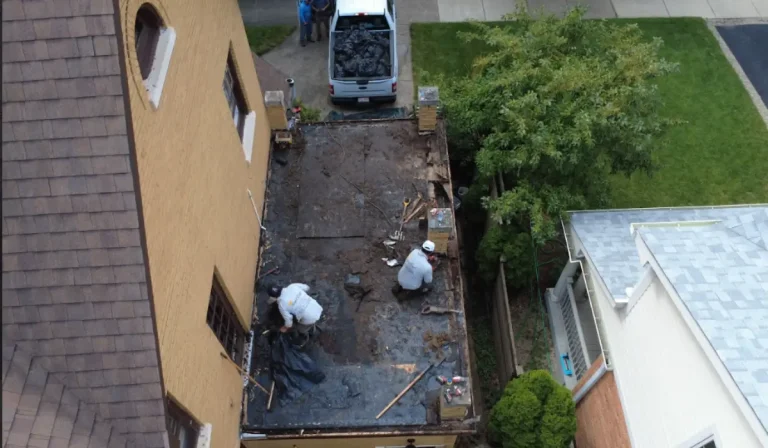 Contractors begin roof demolition early in winter for cost-effective planning of a remodel in 2026 project.