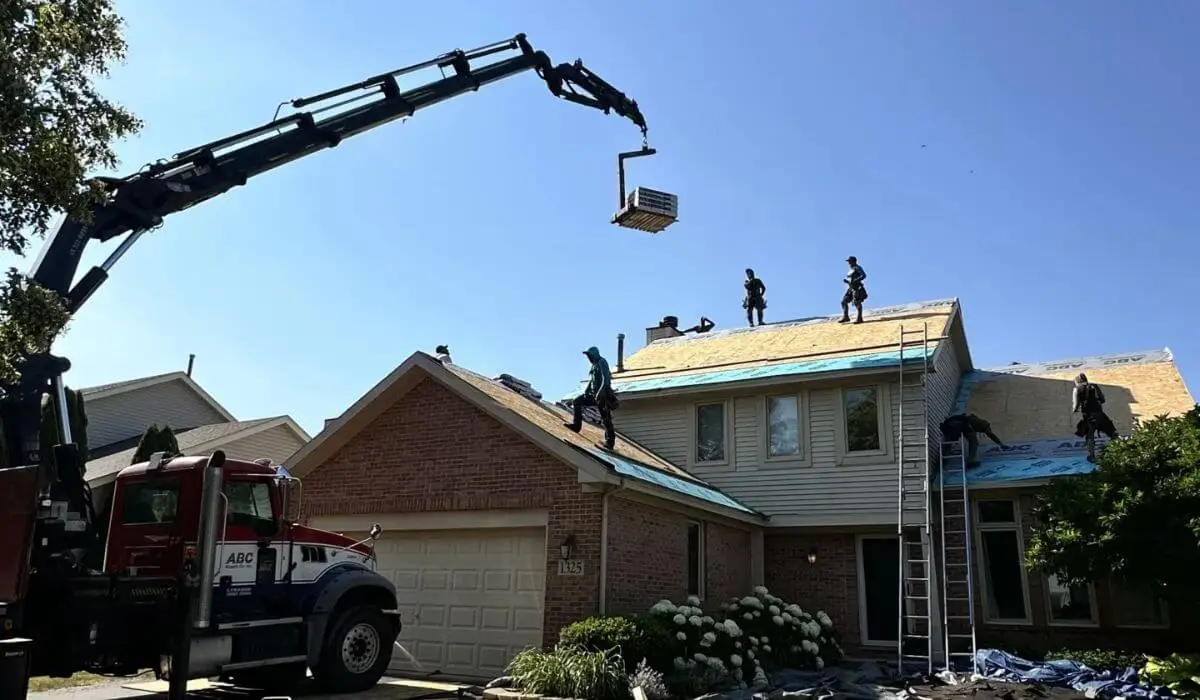 Roof replacement in Downers Grove with crew installing new roof system