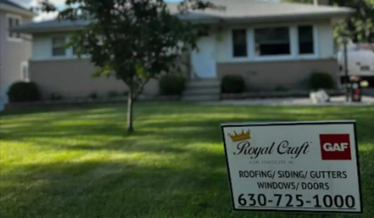 Roofing company in Downers Grove project yard sign outside completed home