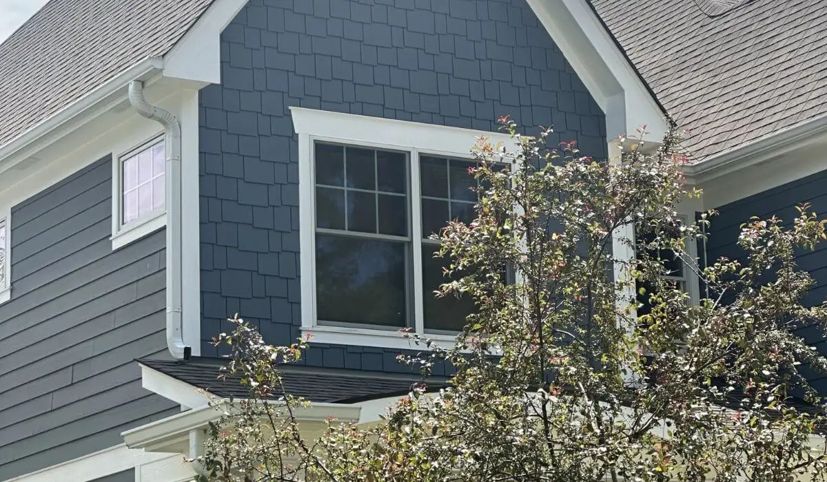 Fresh siding and roof detail on Hinsdale home after exterior renovation