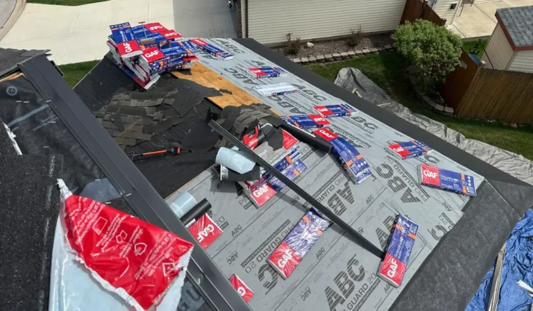 Trusted roofing contractor near Downers Grove installing GAF roof system using ABC underlayment and asphalt shingles.